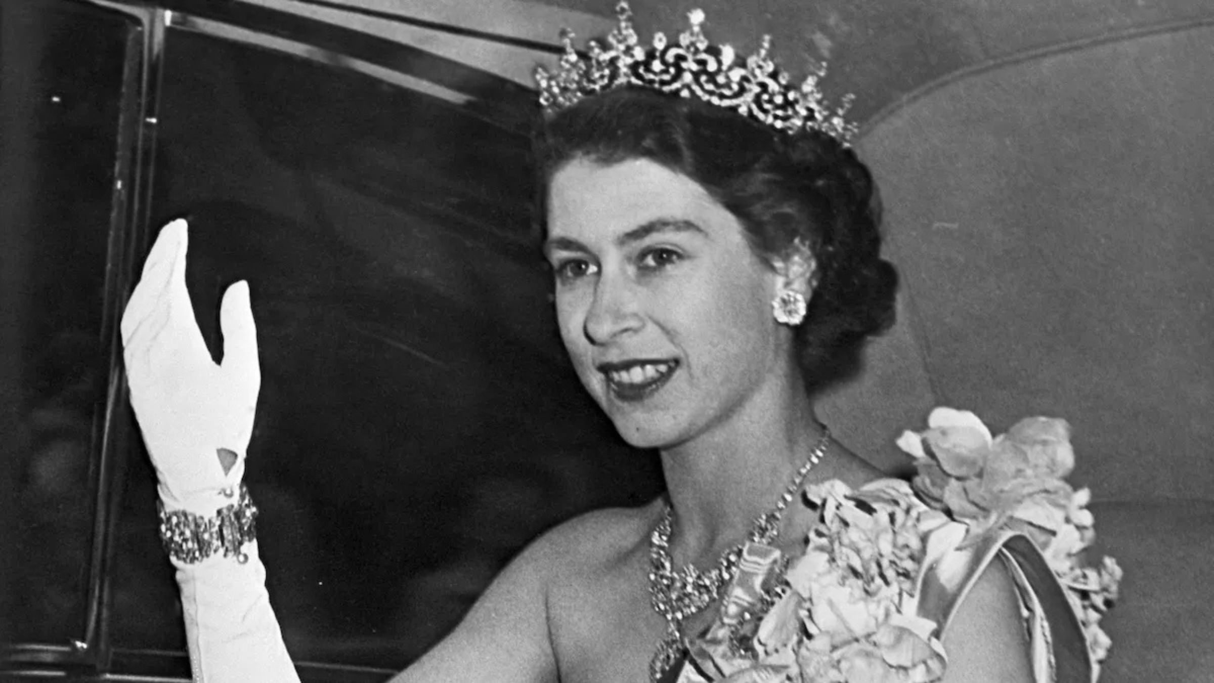 Queen Elizabeth II wearing her diamond bracelet from her personal jewelry collection