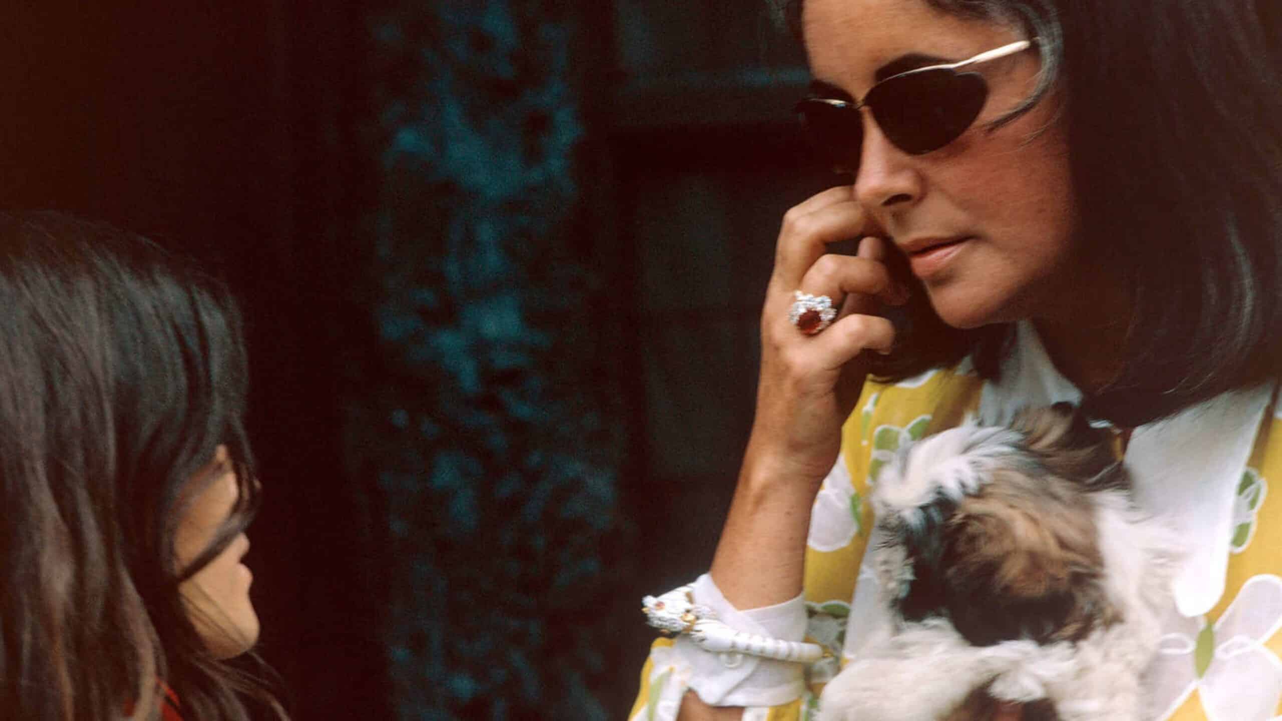 Elizabeth Taylor wearing her ruby and diamond Van Cleef & Arpels ring